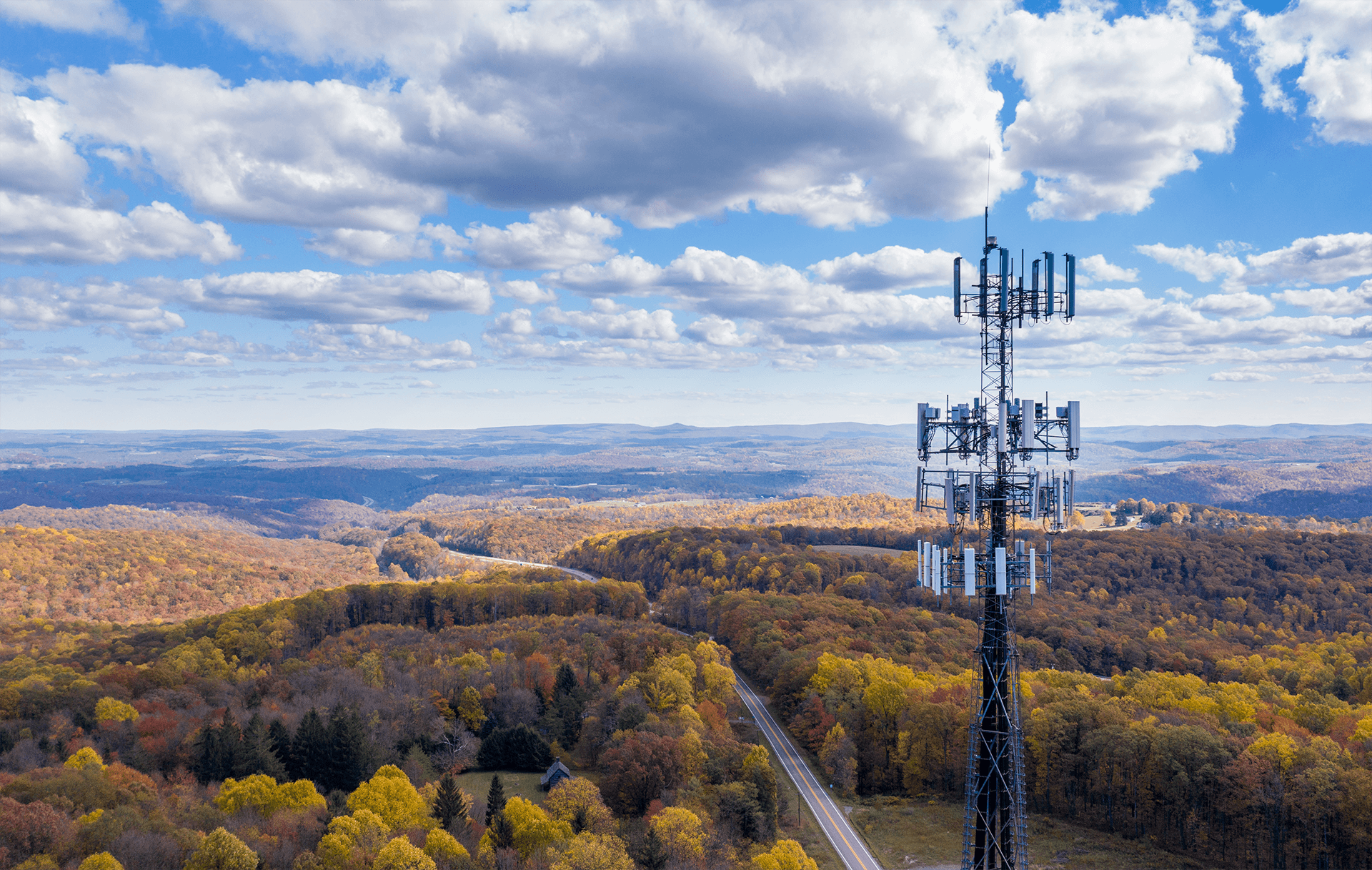 image of a cell phone tower rising into the clouds image of a cell phone tower rising into the clouds
